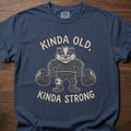 Kinda Old Kinda Strong strength training t shirt featuring weightlifting badger with barbell – Navy