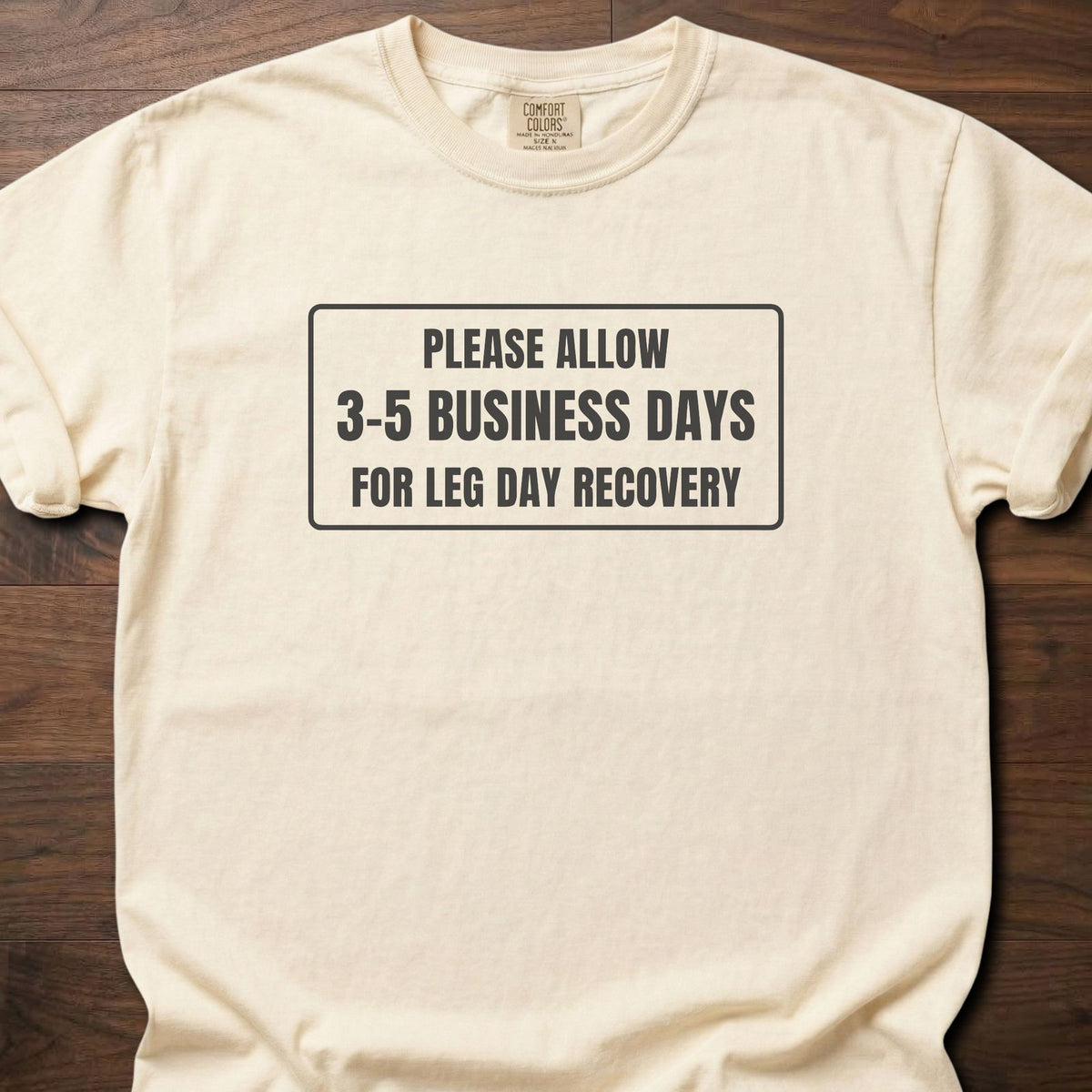Leg Day Recovery funny gym shirt with bold framed block letter graphic – Ivory