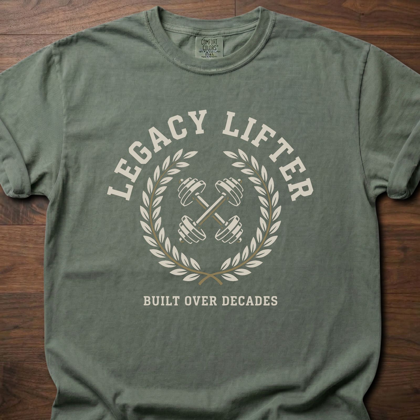 Legacy Lifter strength training t-shirt featuring crossed dumbbells and laurel wreath design – Moss