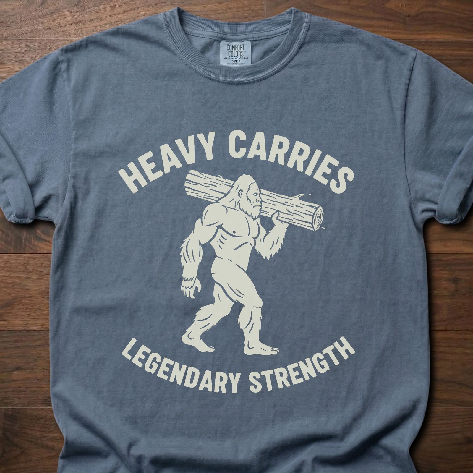 Legendary Strength strength training t-shirt featuring caveman carrying log graphic – Blue Jean
