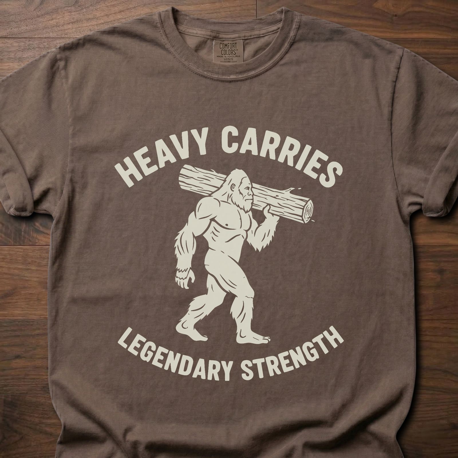 Legendary Strength strength training t-shirt featuring caveman carrying log graphic – Espresso