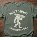 Legendary Strength strength training t-shirt featuring caveman carrying log graphic – Moss