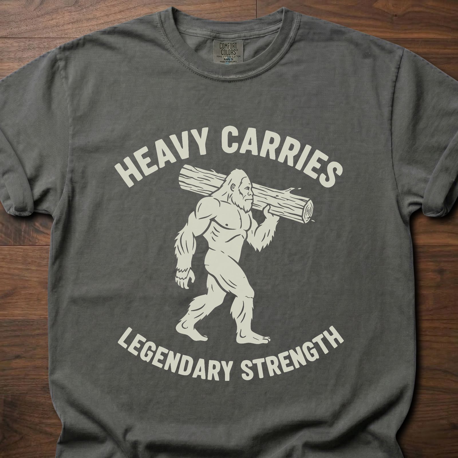 Legendary Strength strength training t-shirt featuring caveman carrying log graphic – Pepper