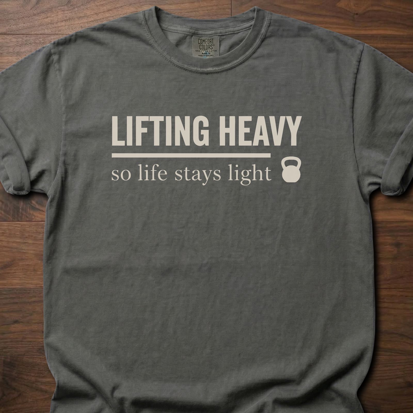 Life Stays Light strength training t shirt with kettlebell and motivational lifting message – Pepper