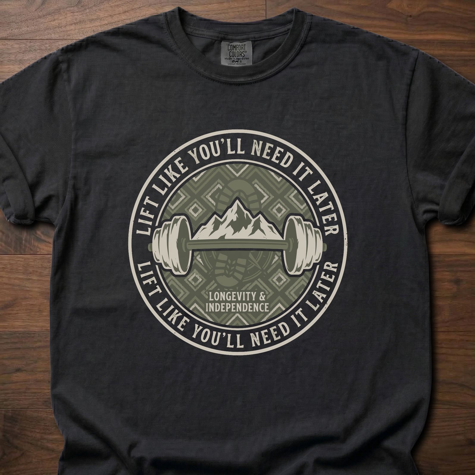 Lift Like You'll Need It Later strength training t-shirt with barbell and mountain badge design – Black