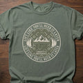 Lift Like You'll Need It Later strength training t-shirt with barbell and mountain badge design – Moss