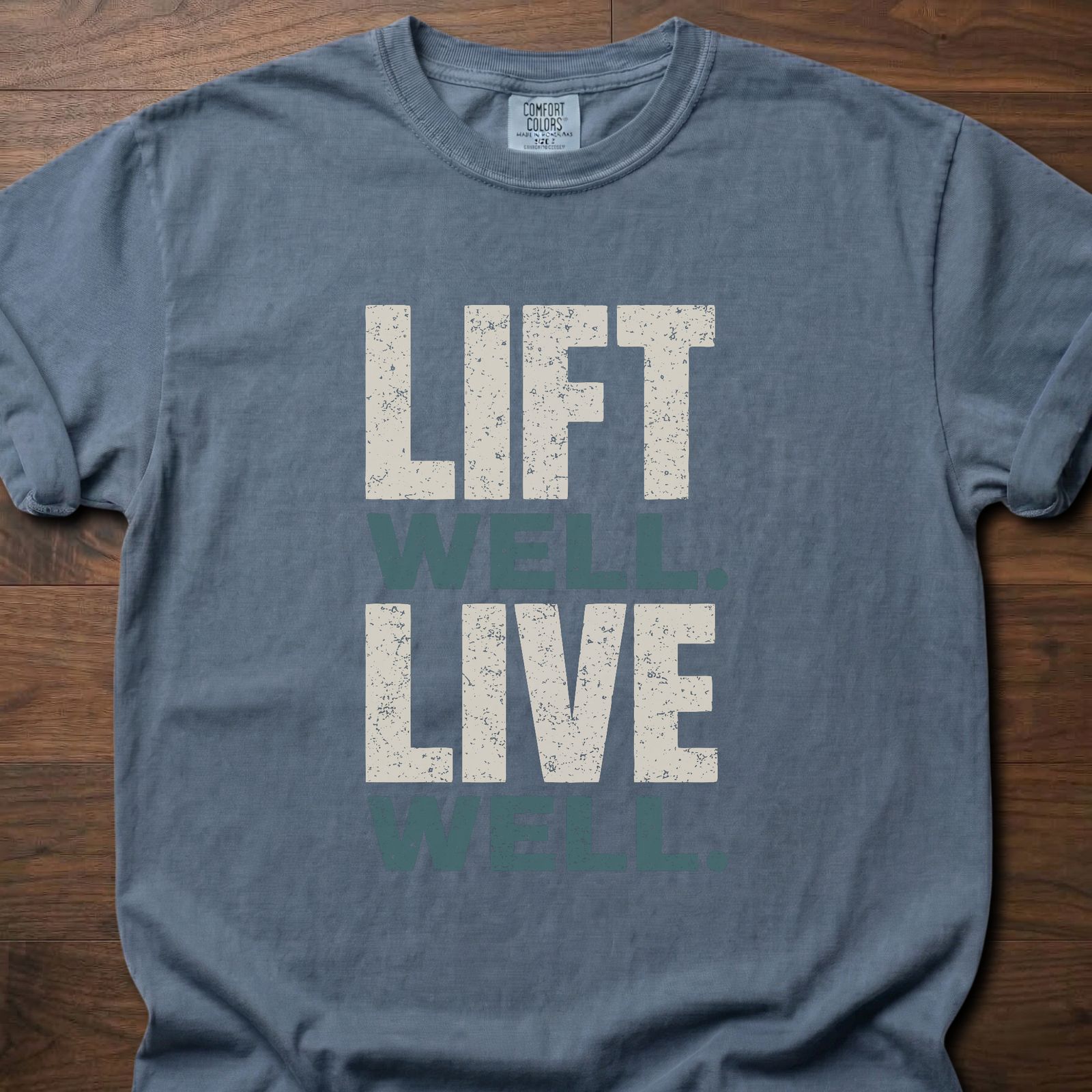 Lift Well Live Well strength training t-shirt with bold stacked distressed text design – Blue Jean