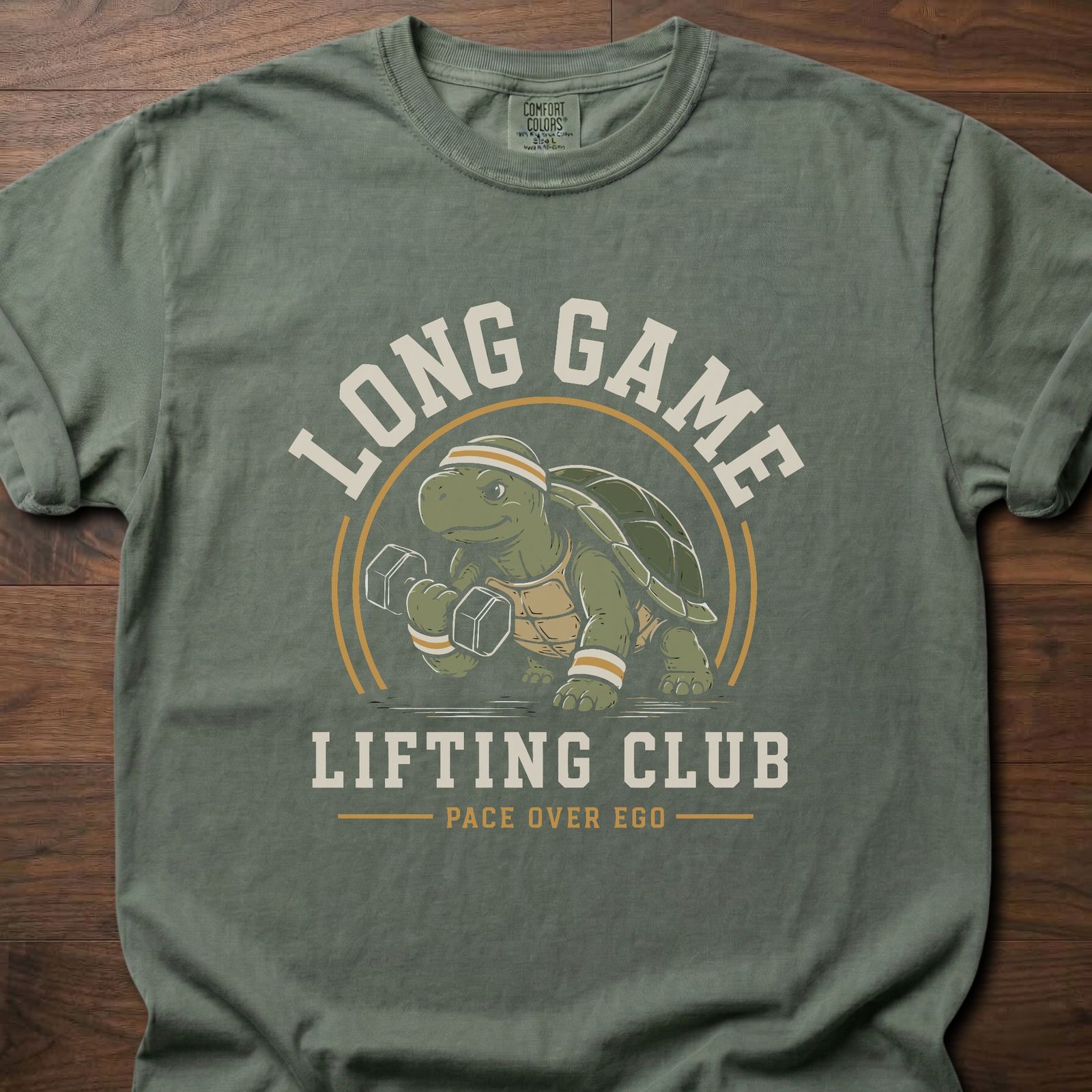 Long Game Lifting Club strength training t-shirt with a dumbbell-lifting tortoise graphic – Moss