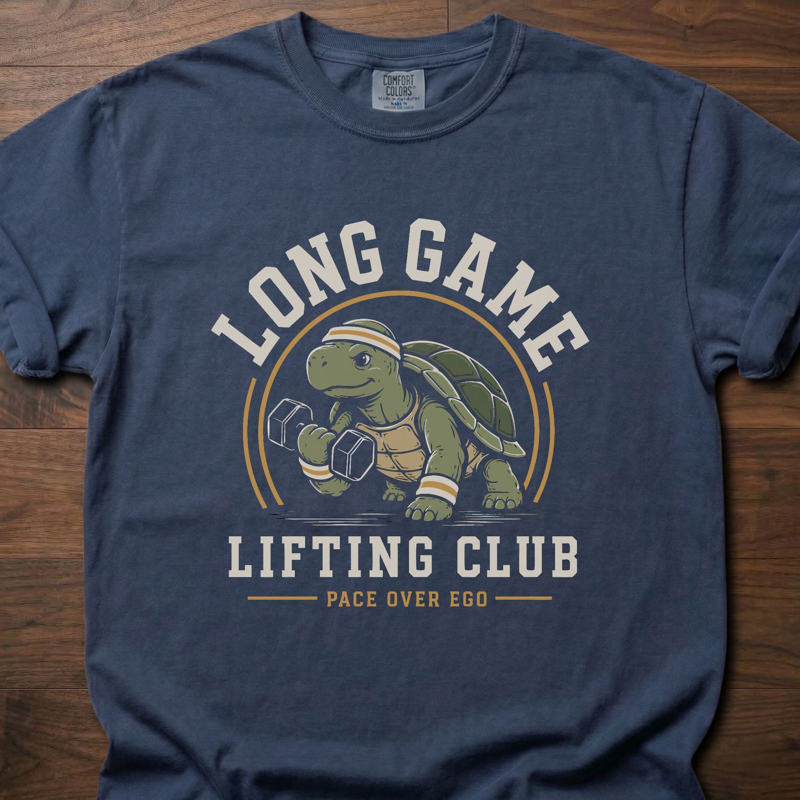 Long Game Lifting Club strength training t-shirt with a dumbbell-lifting tortoise graphic – Navy