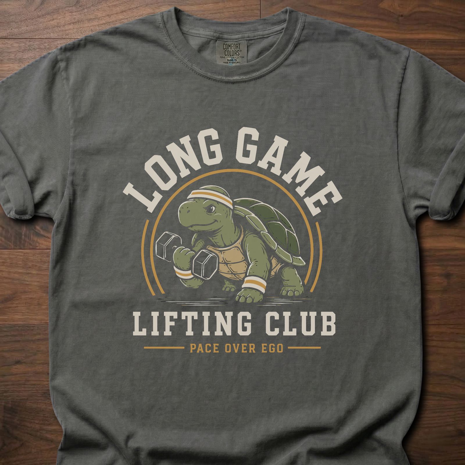 Long Game Lifting Club strength training t-shirt with a dumbbell-lifting tortoise graphic – Pepper