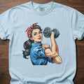 Lucy The Lifter strength training t-shirt featuring empowered woman with dumbbell design – Chambray