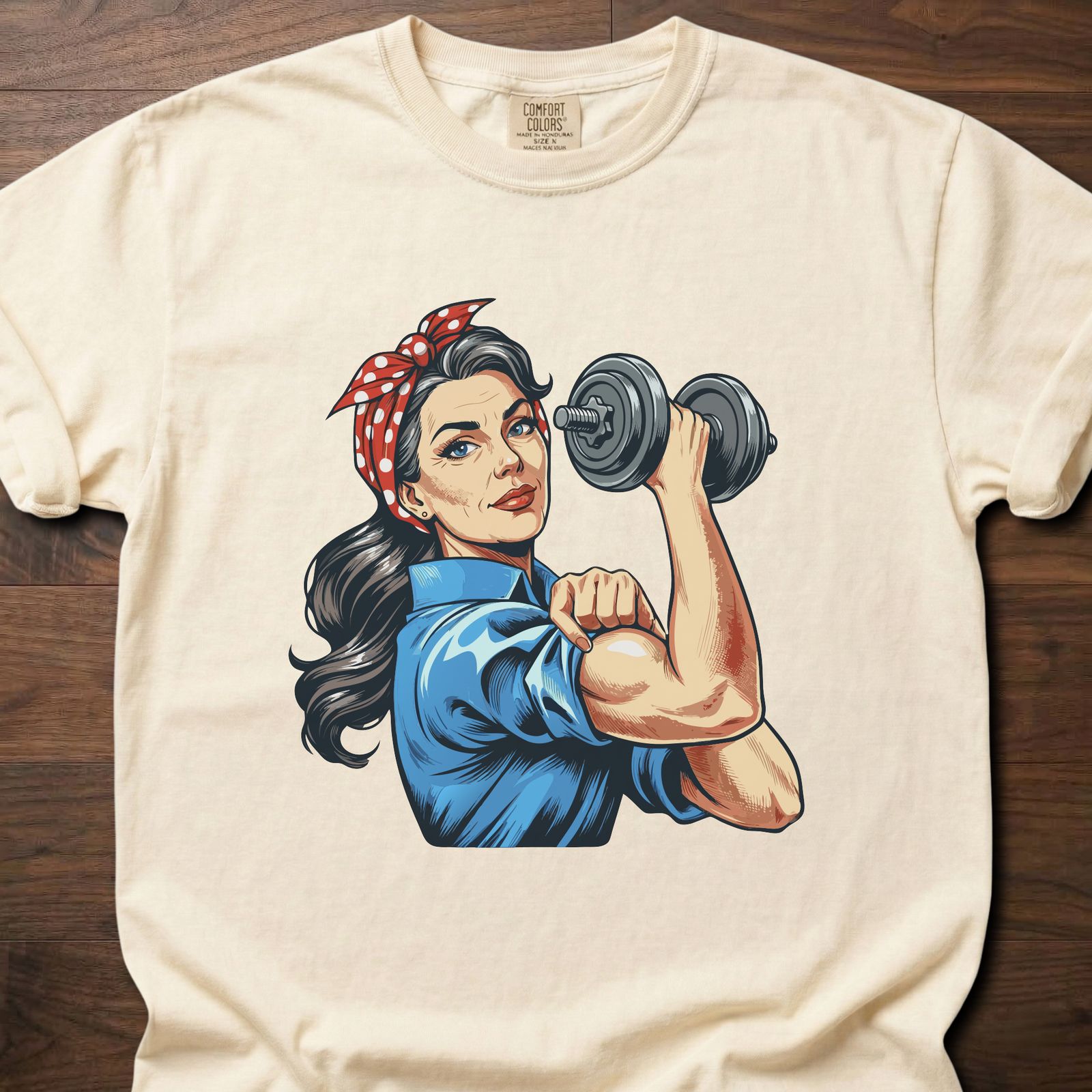 Lucy The Lifter strength training t-shirt featuring empowered woman with dumbbell design – Ivory
