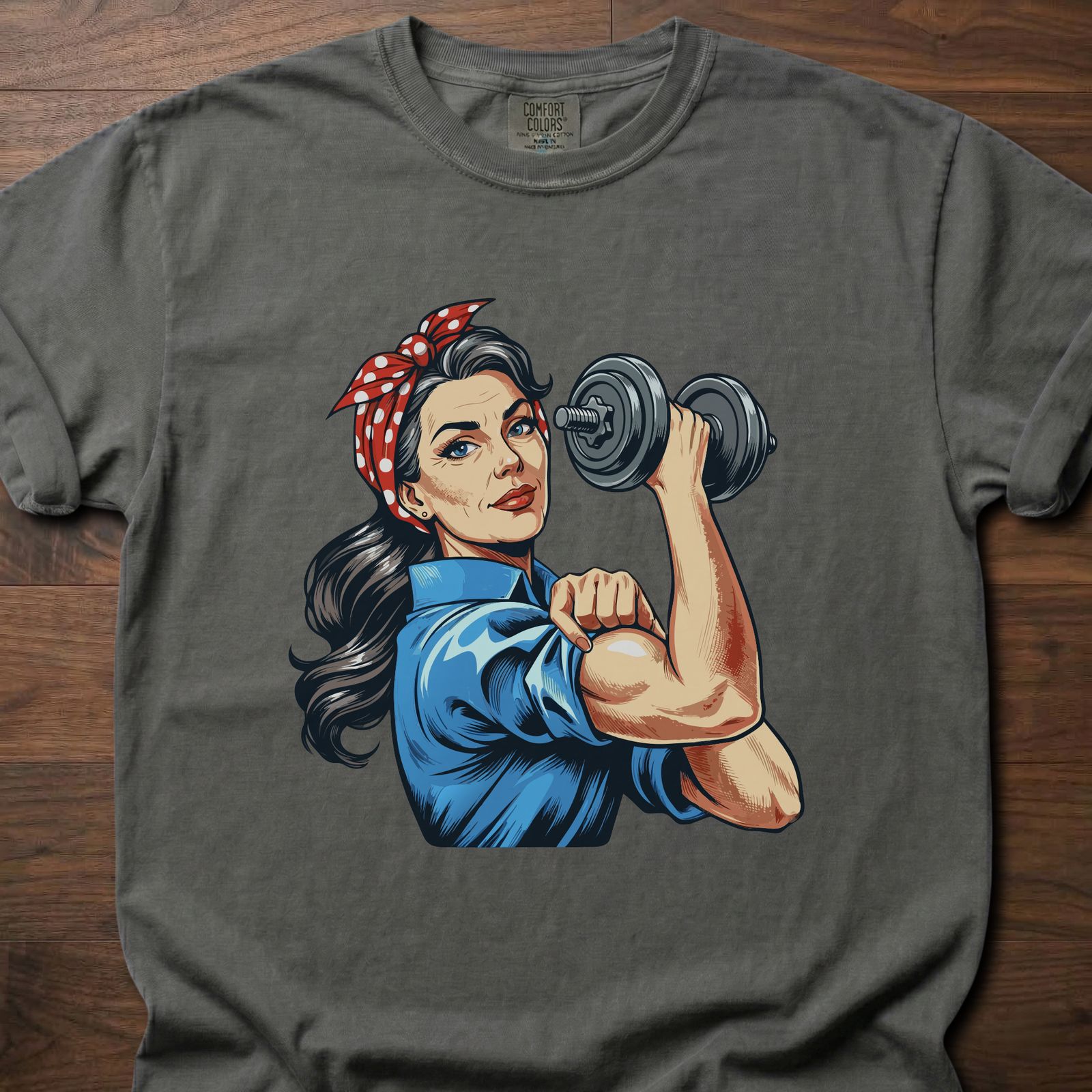 Lucy The Lifter strength training t-shirt featuring empowered woman with dumbbell design – Pepper