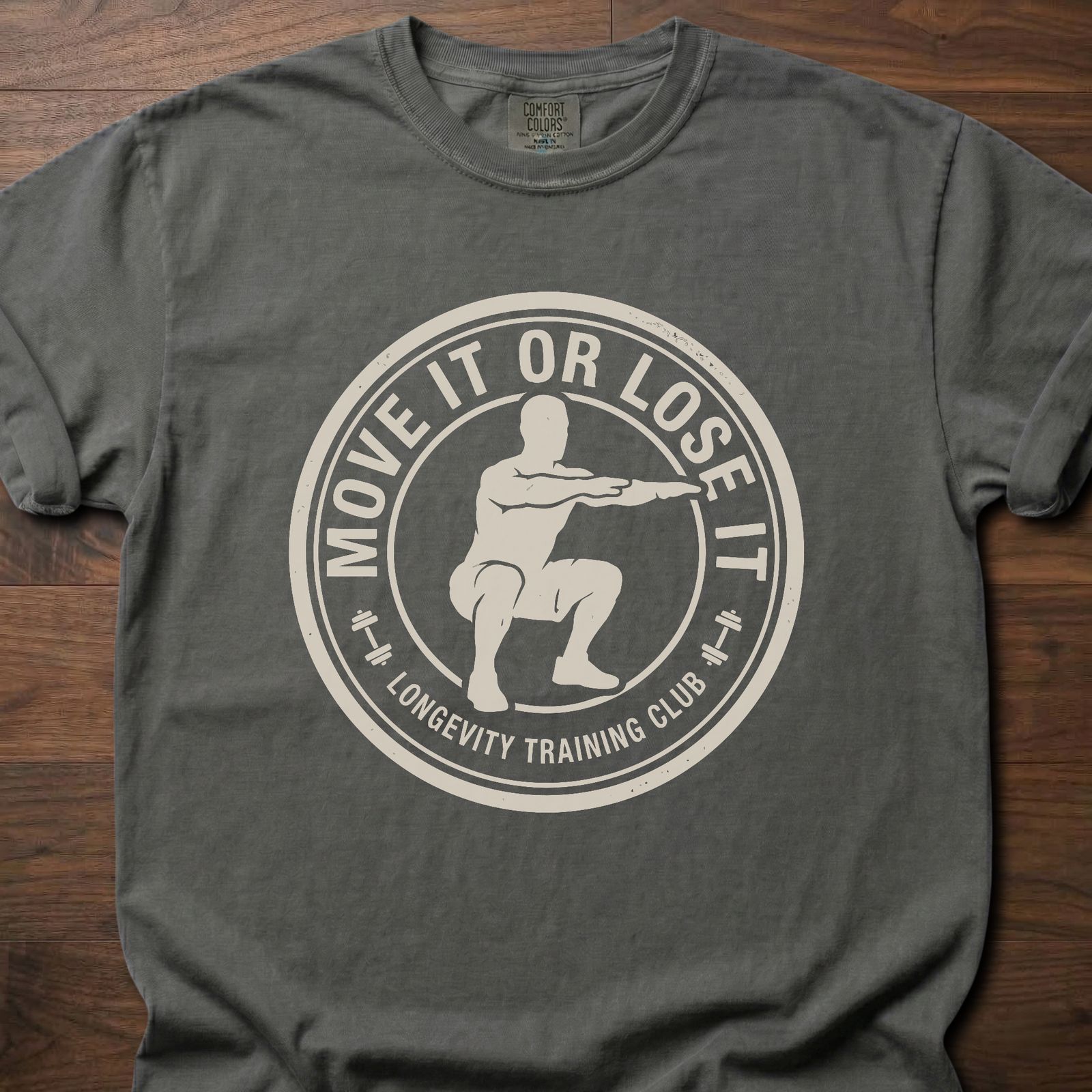 Move It Or Lose It fitness lifestyle apparel featuring figure doing squat inside circular badge design – Pepper