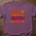 Muscle Granny Era funny gym shirt with retro groovy typographic graphic and floral accents – Berry