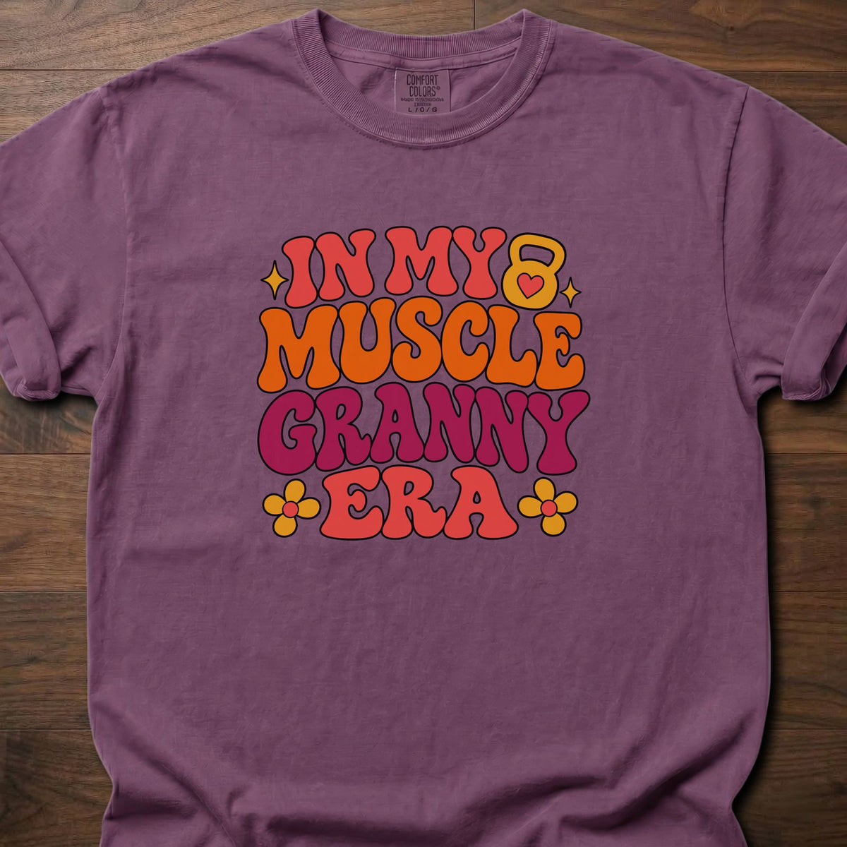 Muscle Granny Era funny gym shirt with retro groovy typographic graphic and floral accents – Berry