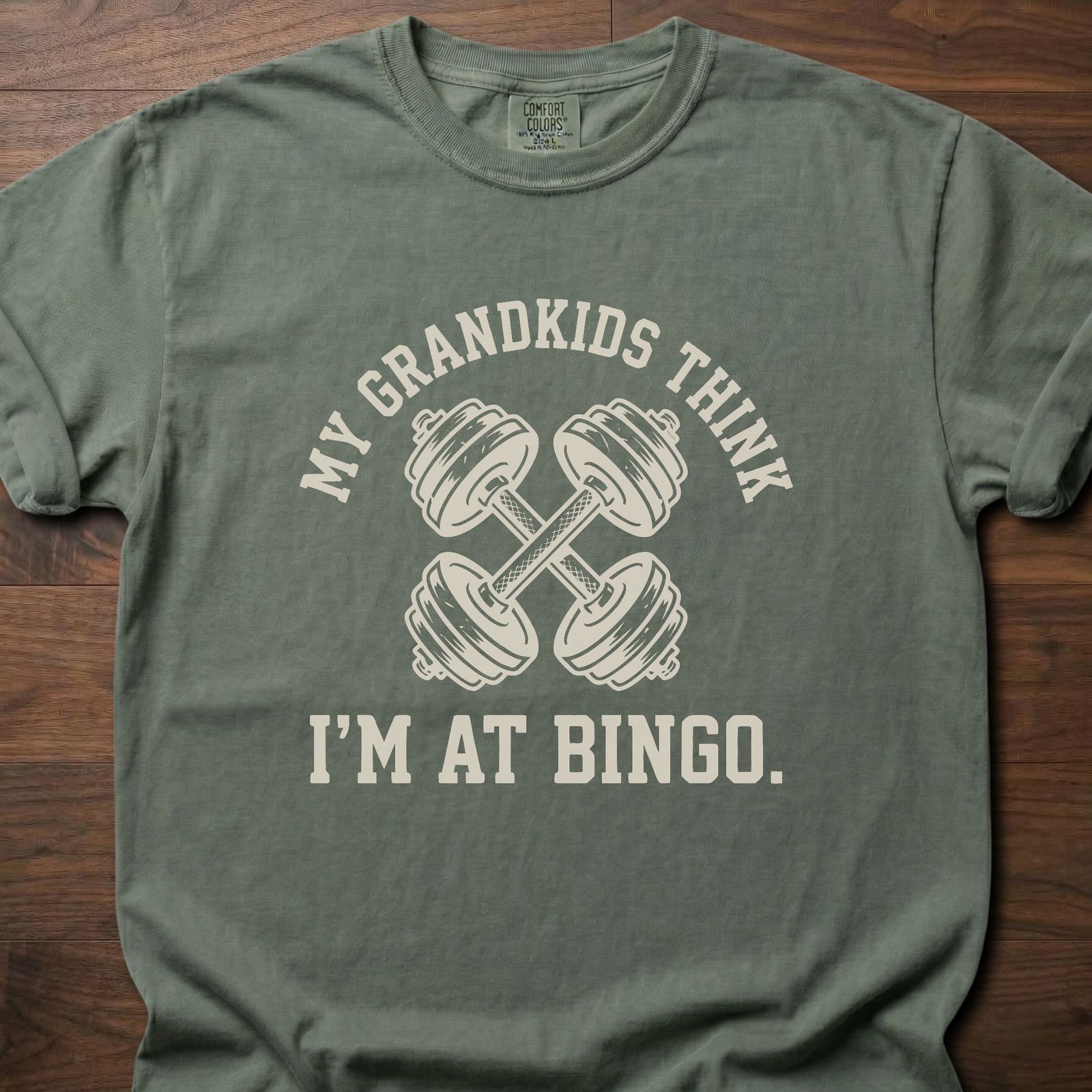 My Grandkids Think strength training t-shirt with crossed dumbbells and bingo humor – Moss