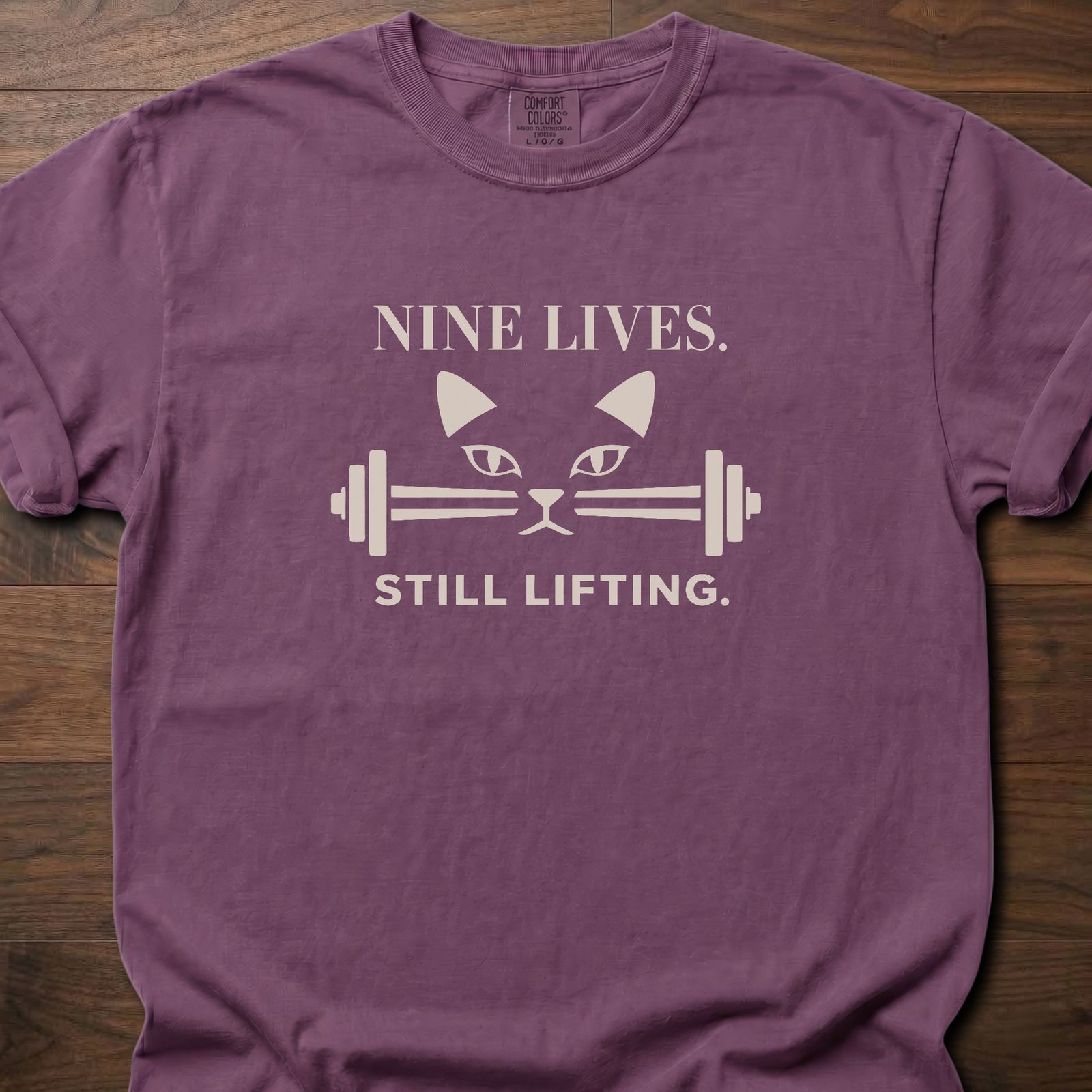 Nine Lives strength training lifestyle t-shirt with cat face and barbell graphic – Berry