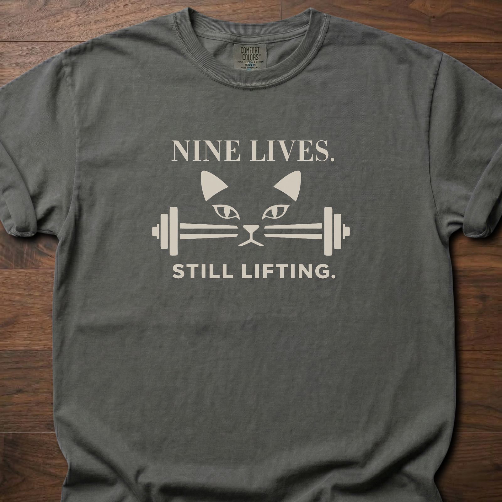Nine Lives strength training lifestyle t-shirt with cat face and barbell graphic – Pepper