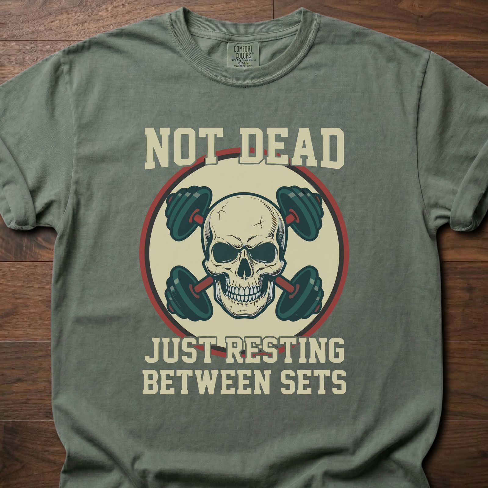 Not Dead Just Resting strength training t shirt with skull and dumbbells design – Moss