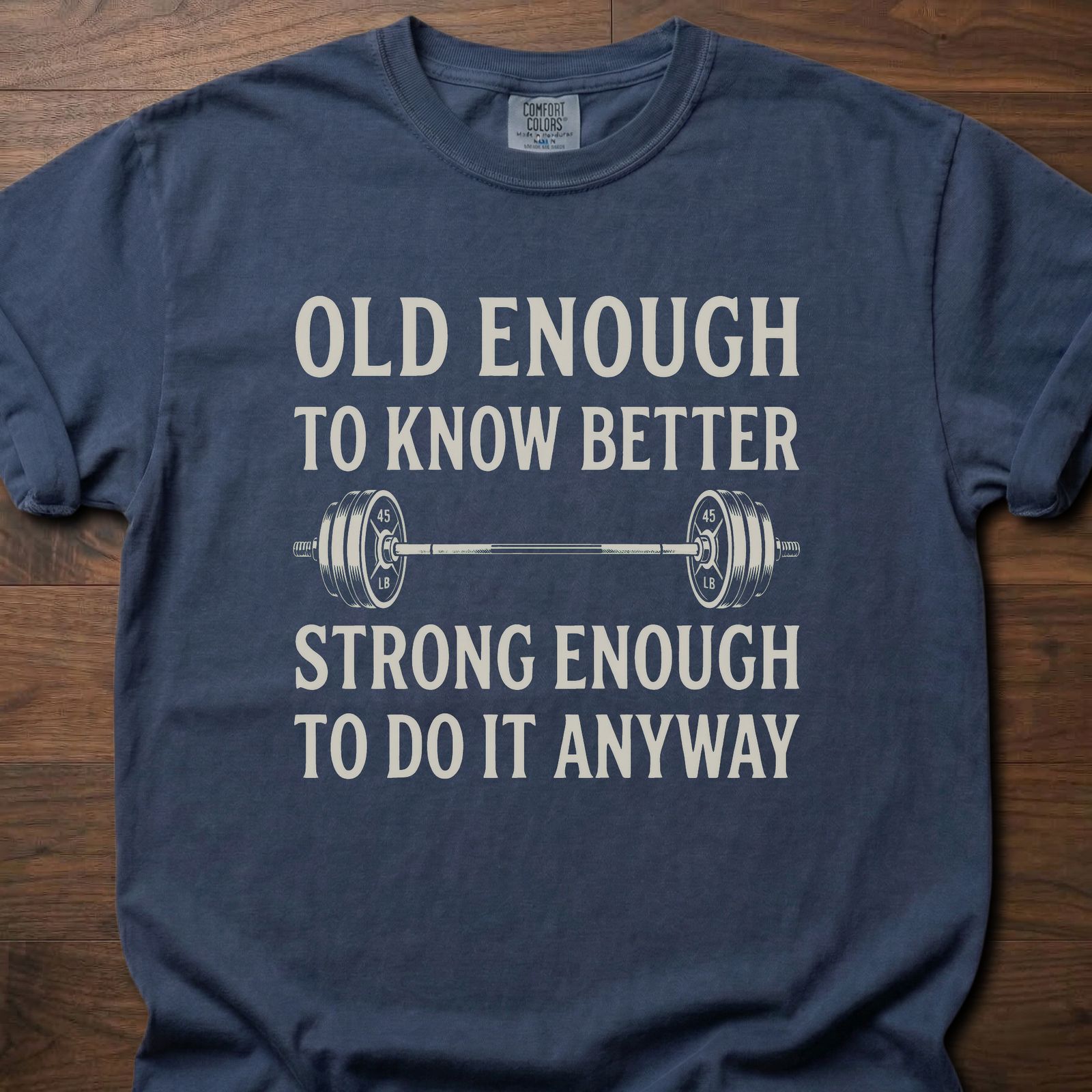 Old Enough T-Shirt featuring barbell graphic with humorous text about strength training lifestyle clothing – Navy