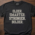 Older Smarter Stronger Bolder strength training t-shirt with bold statement typography – Black