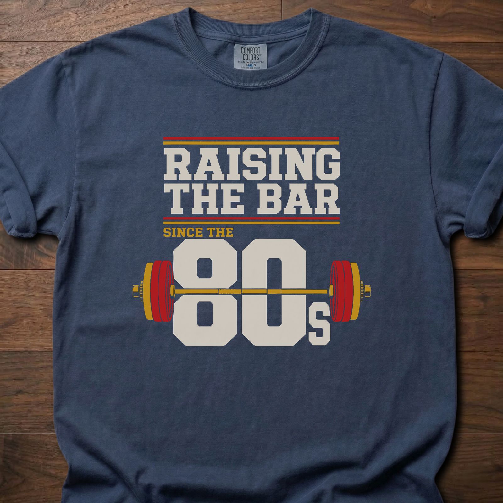 Raising The Bar strength training t-shirt with loaded barbell and retro 80s graphic – Navy