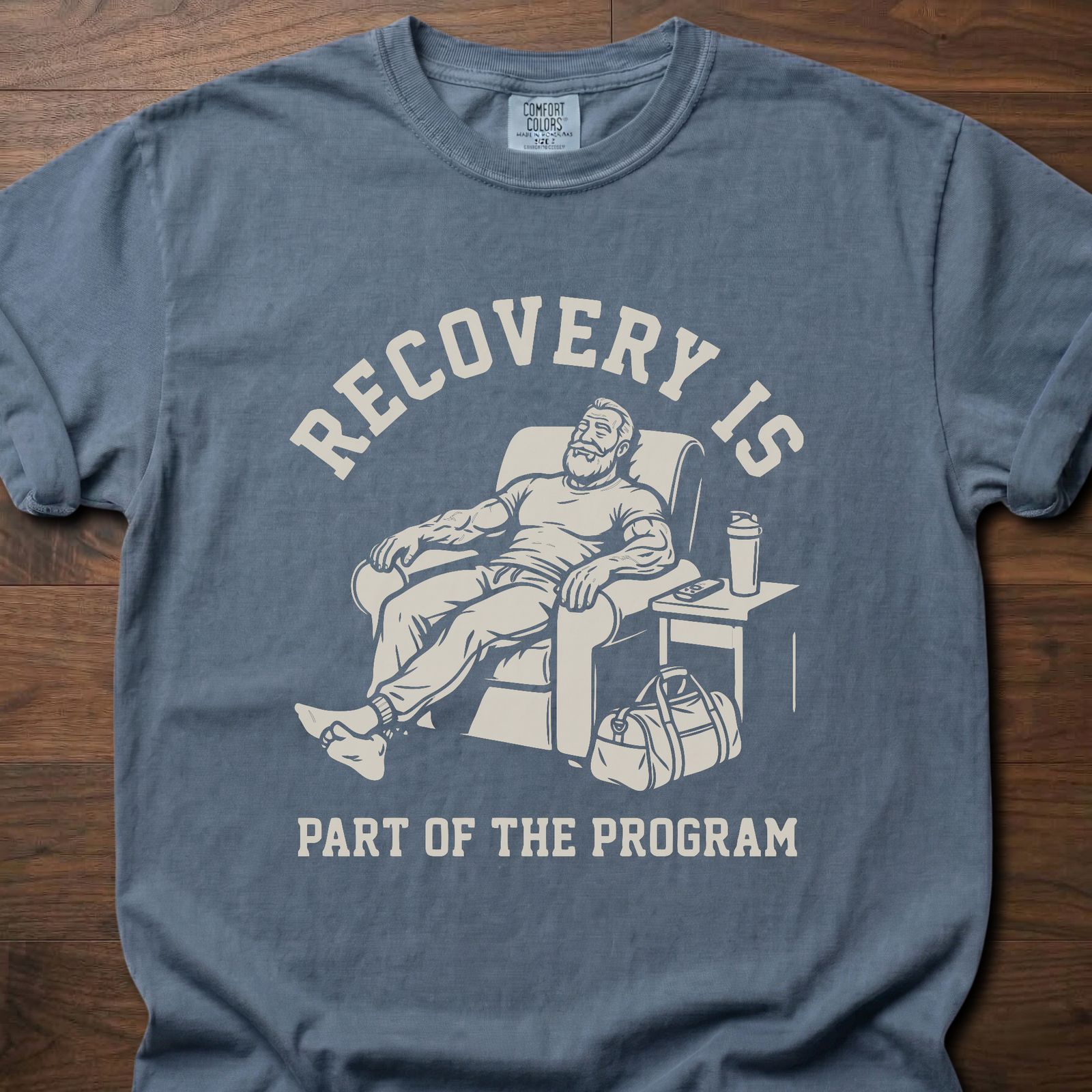 Recovery Is fitness lifestyle apparel featuring relaxed athlete in recliner with gym bag – Blue Jean