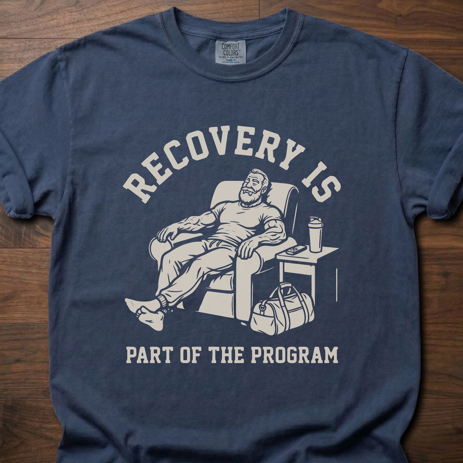 Recovery Is fitness lifestyle apparel featuring relaxed athlete in recliner with gym bag – Navy