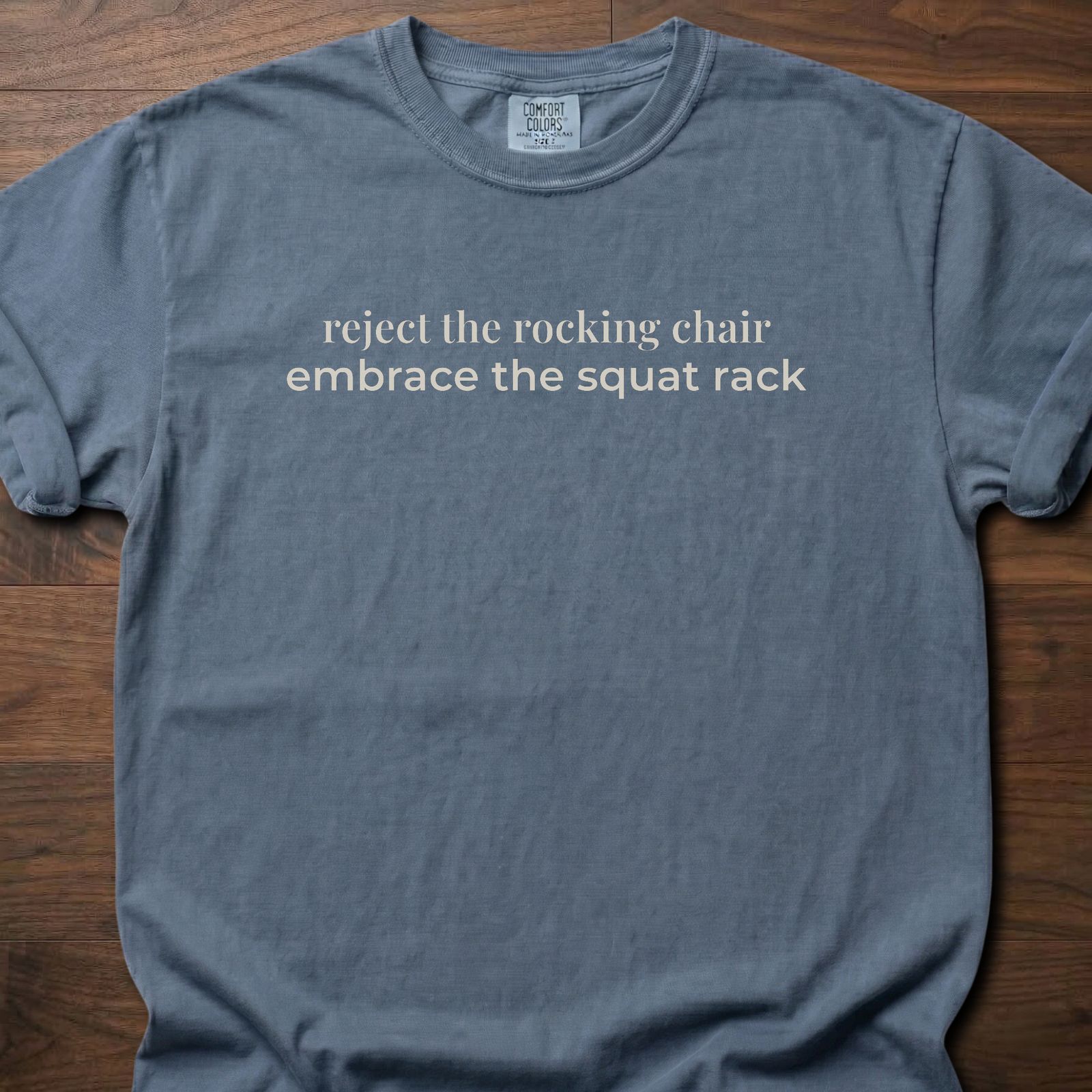 Reject The Rocking Chair strength training lifestyle clothing with motivational embrace the squat rack text – Blue Jean