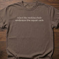 Reject The Rocking Chair strength training lifestyle clothing with motivational embrace the squat rack text – Espresso