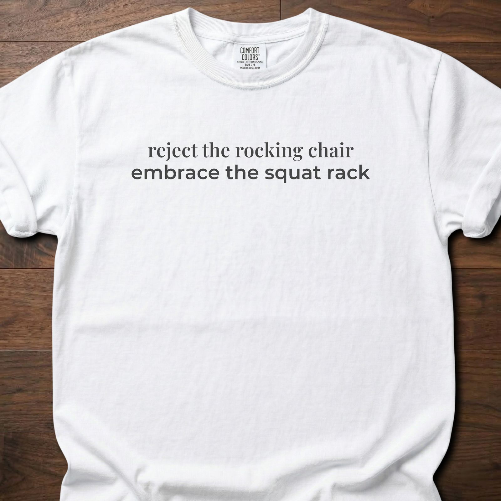 Reject The Rocking Chair strength training lifestyle clothing with motivational embrace the squat rack text – White