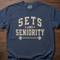 Sets And Seniority strength training t-shirt with collegiate lettering, stars, and barbell graphic – Navy