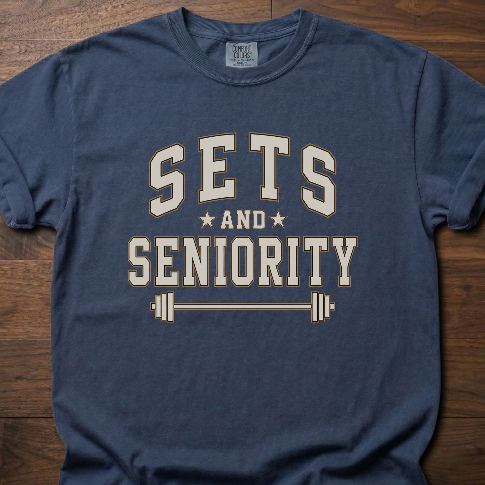 Sets And Seniority strength training t-shirt with collegiate lettering, stars, and barbell graphic – Navy