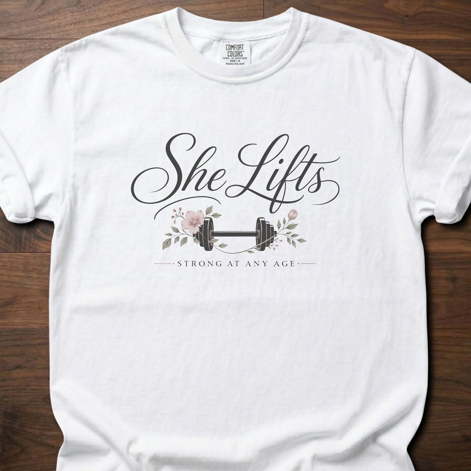 She Lifts strength training t-shirt with barbell and floral design – White