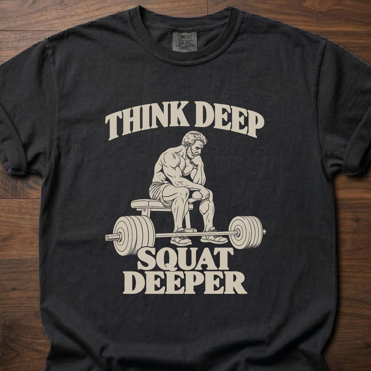 Squat Deeper funny gym shirt with vintage-style bold typographic illustration – Black
