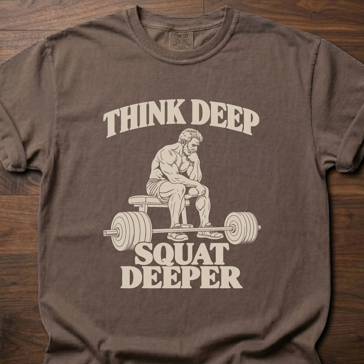 Squat Deeper funny gym shirt with vintage-style bold typographic illustration – Espresso