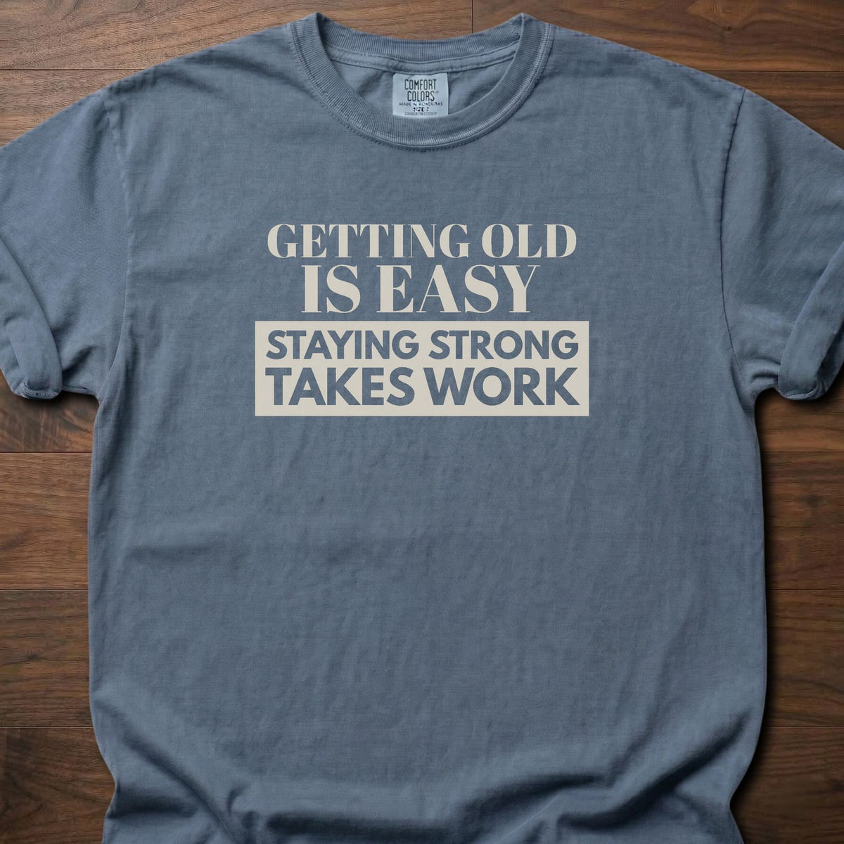 Staying Strong strength training t-shirt with bold vintage-style typographic graphic – Blue Jean