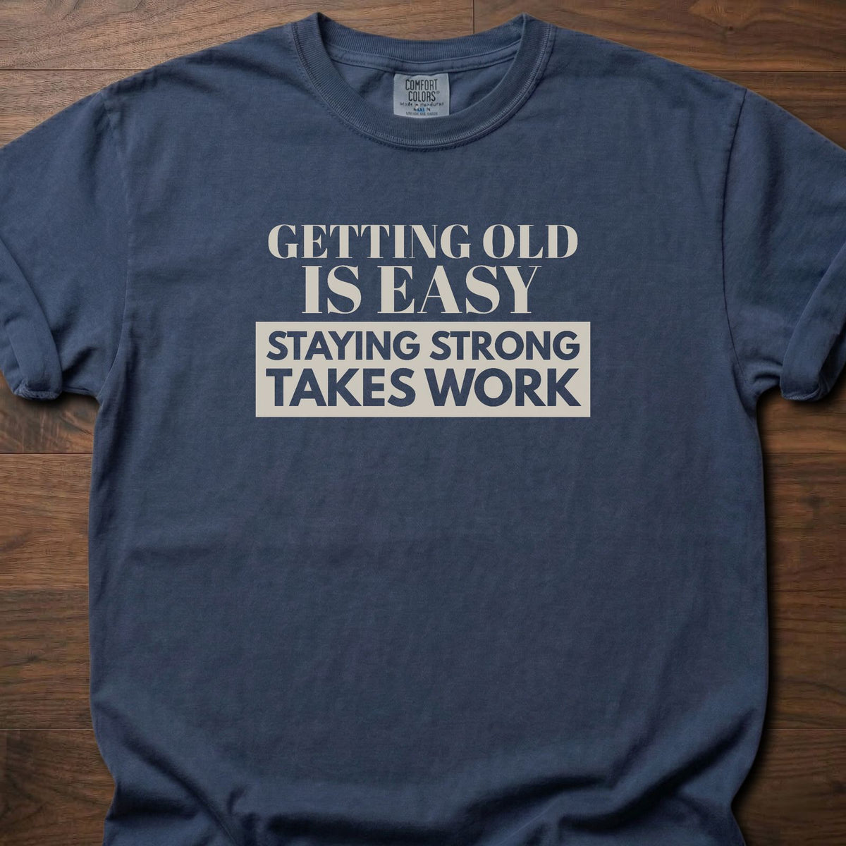 Staying Strong strength training t-shirt with bold vintage-style typographic graphic – Navy