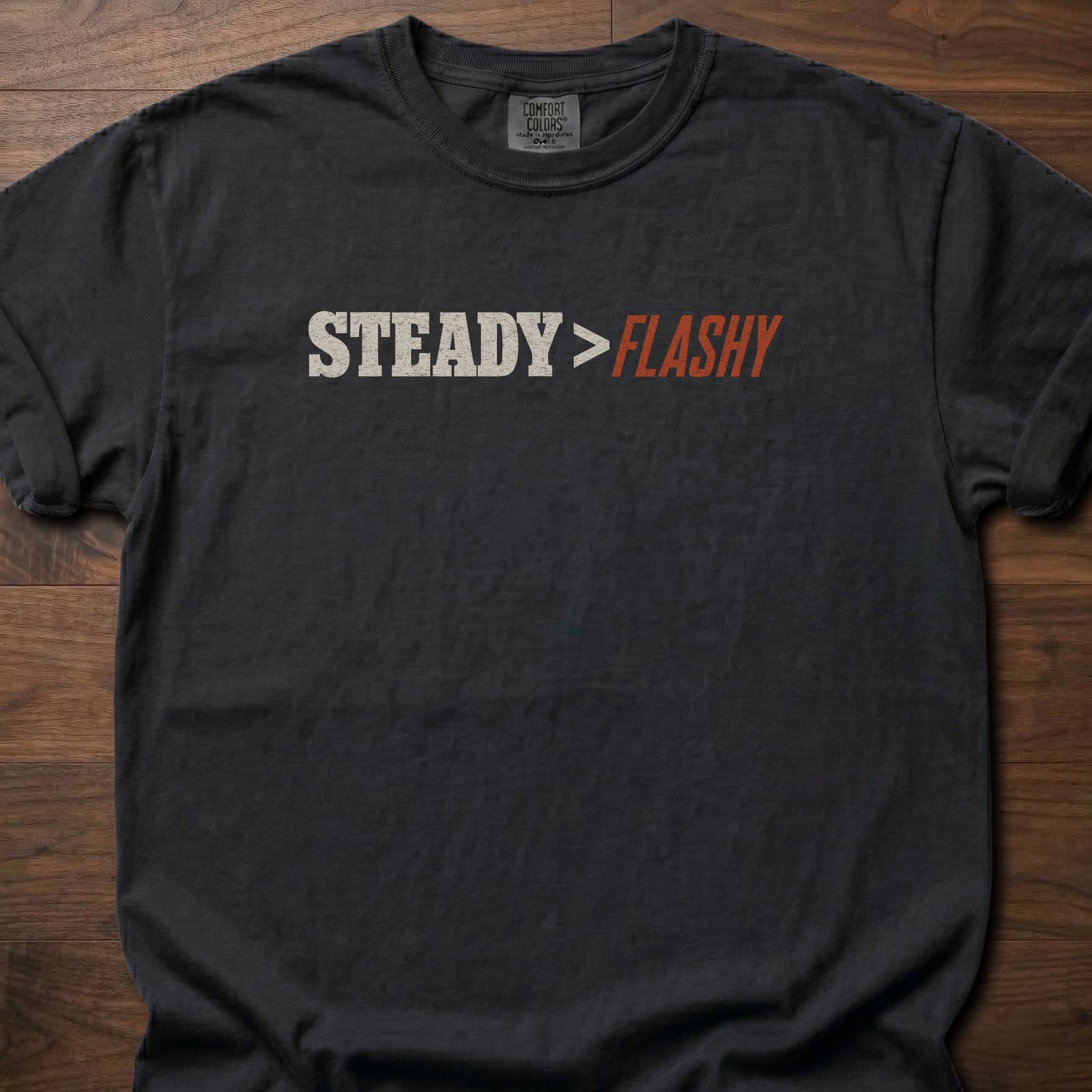 Steady Beats Flashy strength training lifestyle t-shirt with bold STEADY greater than FLASHY text – Black