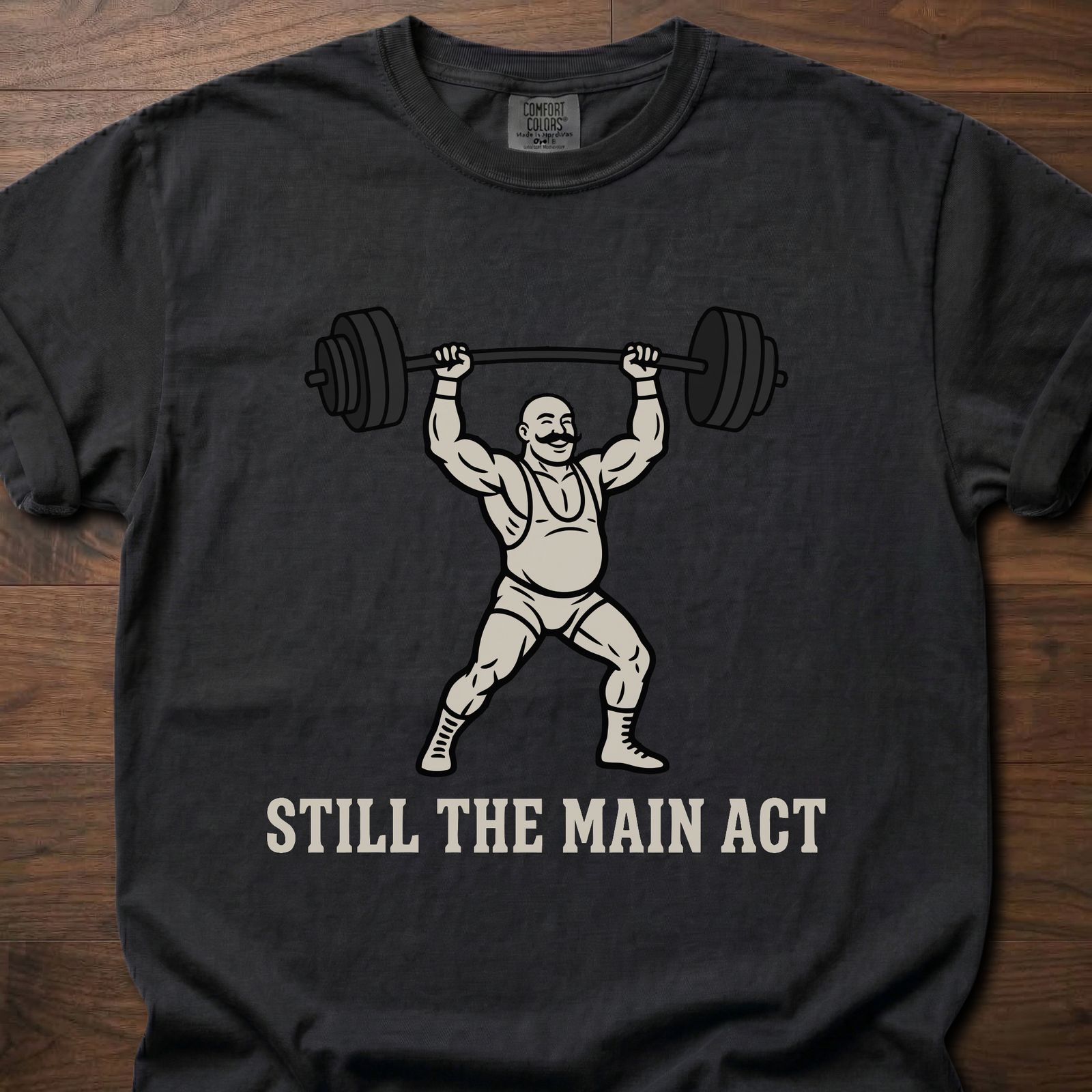 Still The Main Act fitness lifestyle t shirts featuring strongman lifting heavy barbell overhead – Black