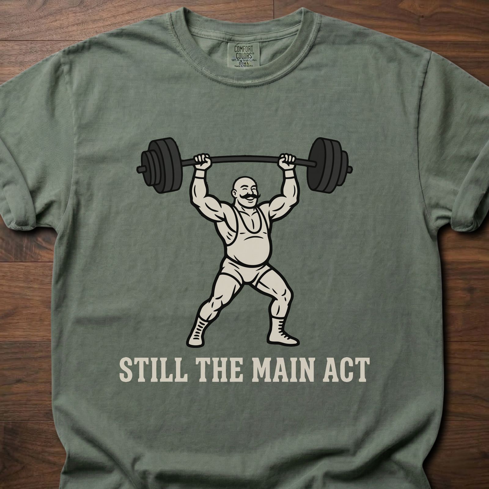Still The Main Act fitness lifestyle t shirts featuring strongman lifting heavy barbell overhead – Moss