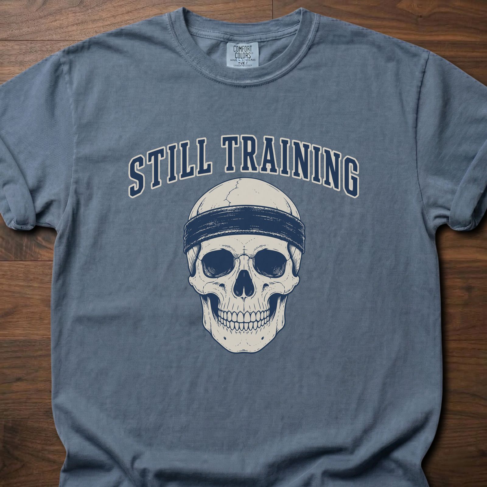 Still Training Skull fitness lifestyle t shirt featuring skull with headband graphic – Blue Jean
