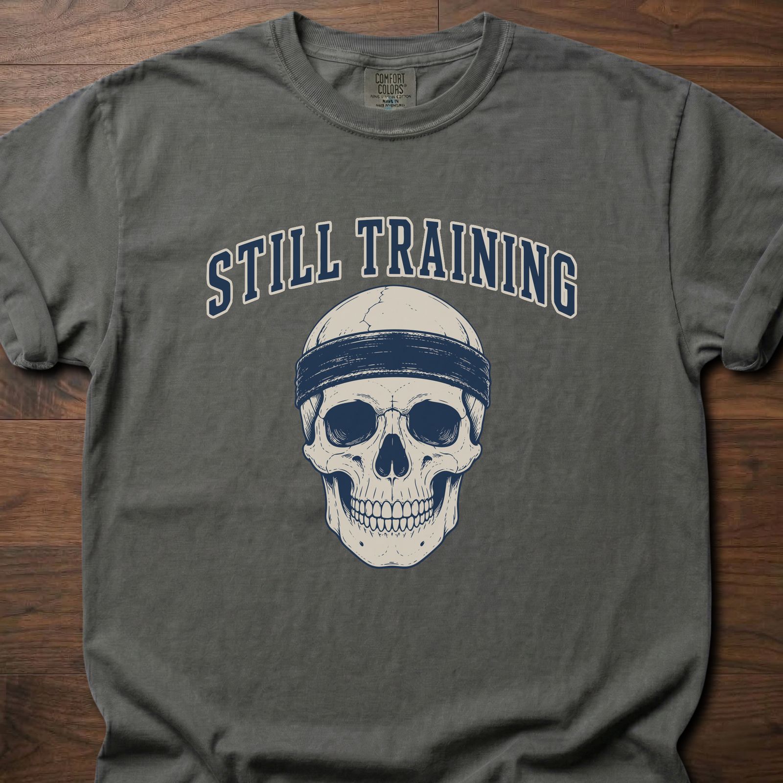 Still Training Skull fitness lifestyle t shirt featuring skull with headband graphic – Pepper