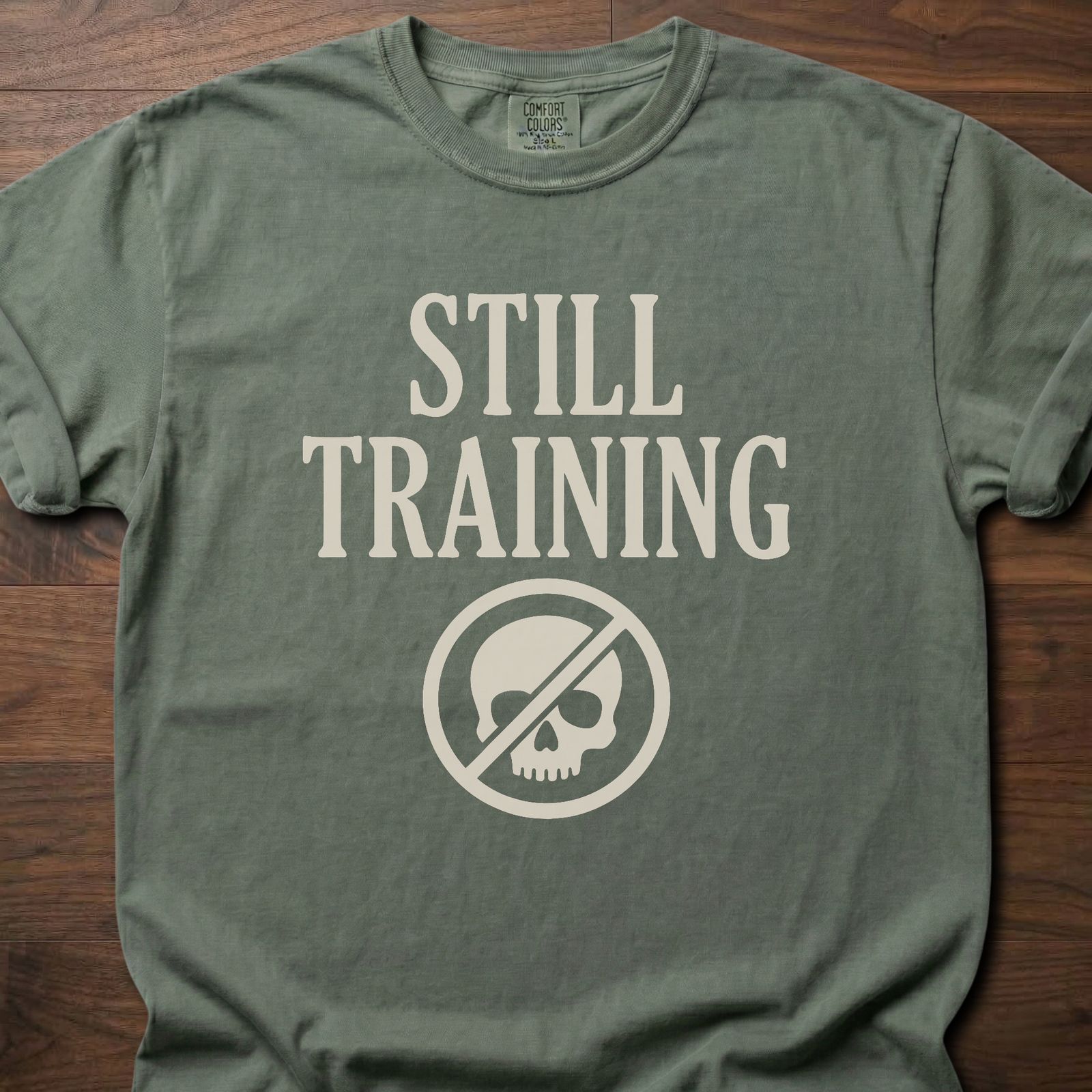 Still Training longevity fitness apparel t-shirt with crossed-out skull logo design – Moss