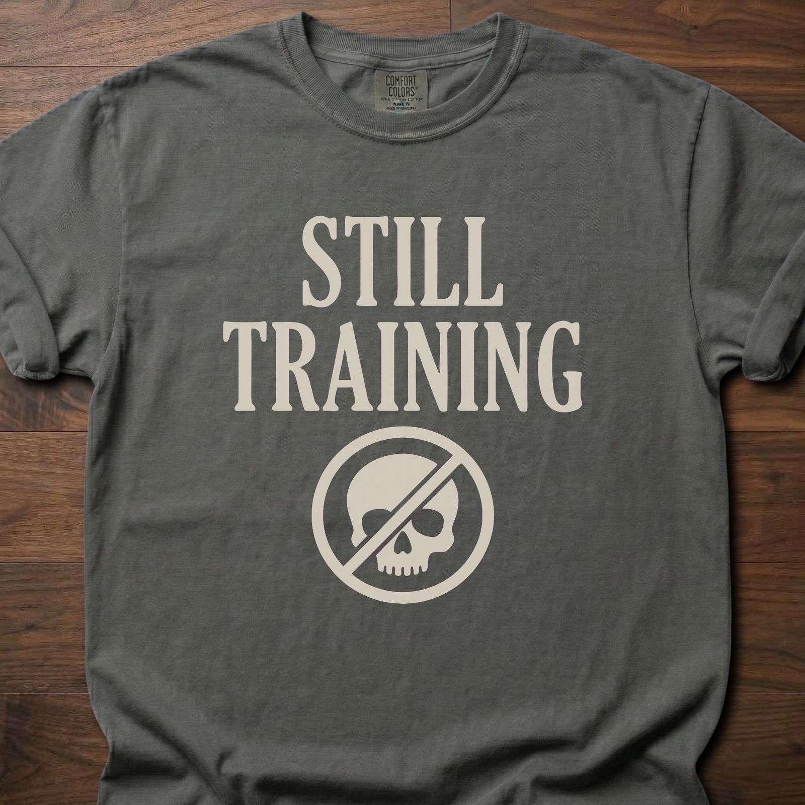 Still Training longevity fitness apparel t-shirt with crossed-out skull logo design – Pepper