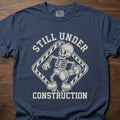 Still Under Construction strength training t shirt featuring skeleton with hard hat and caution tape design – Navy