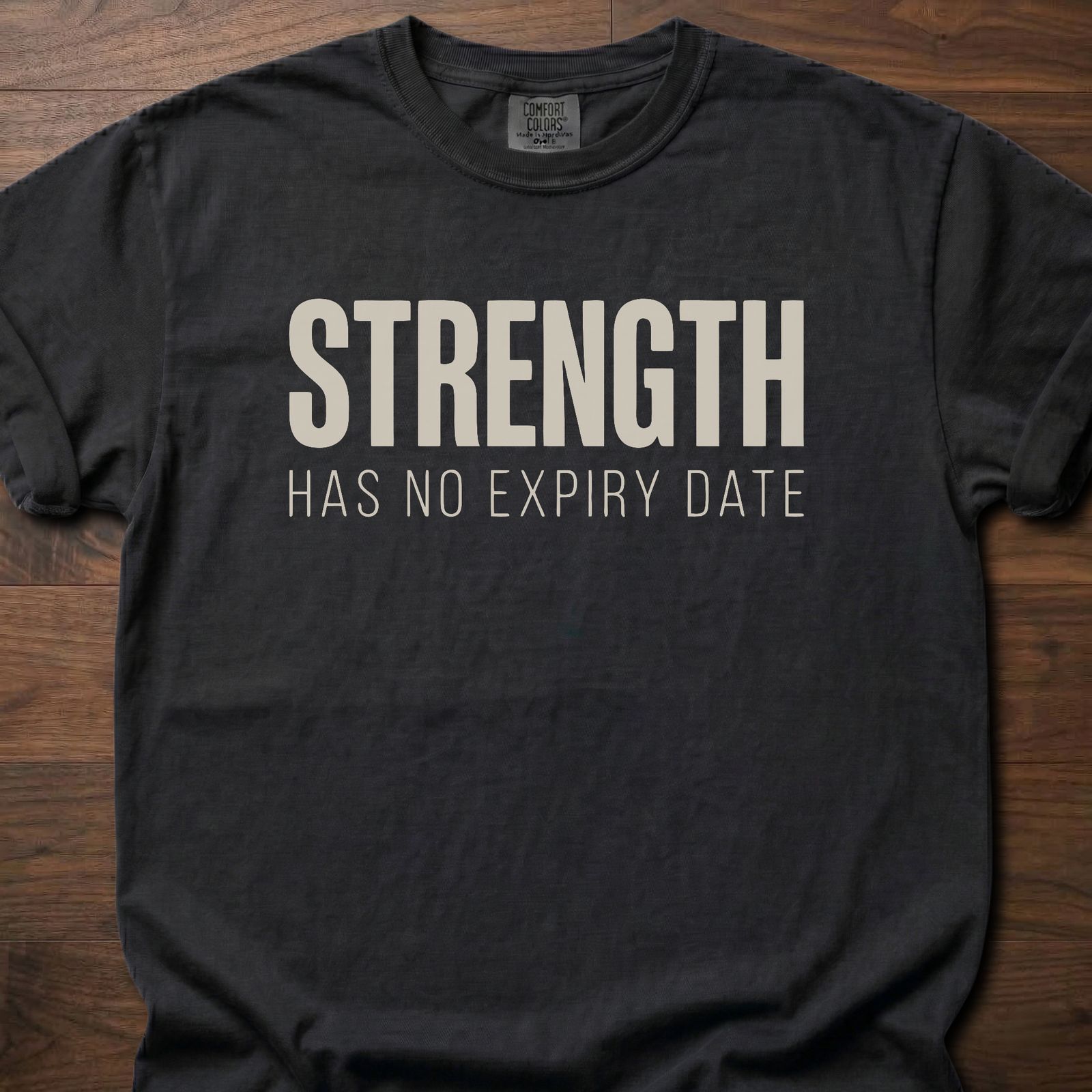 Strength Has No Expiry Date strength training t-shirt with bold text design – Black
