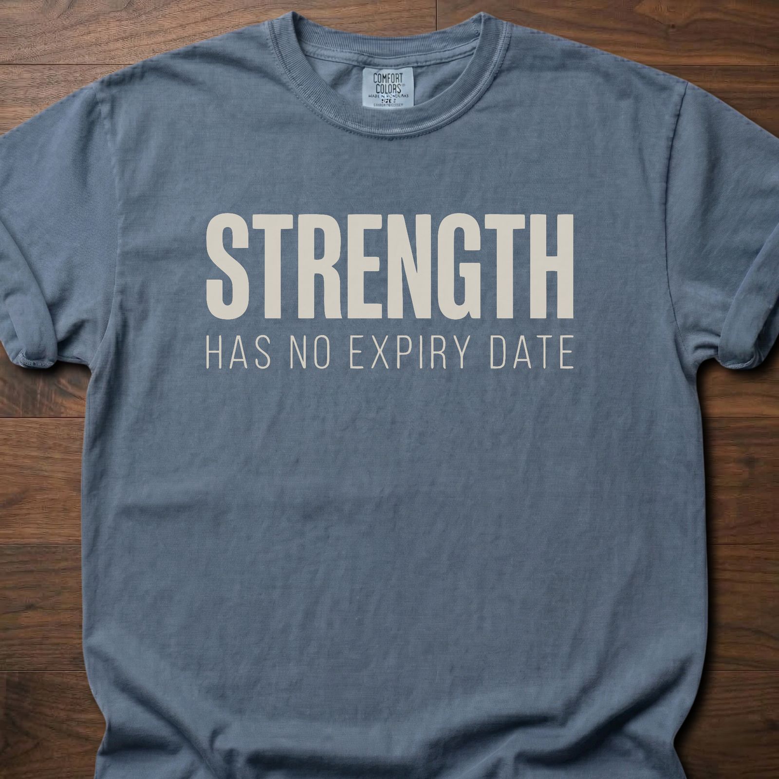 Strength Has No Expiry Date strength training t-shirt with bold text design – Blue Jean