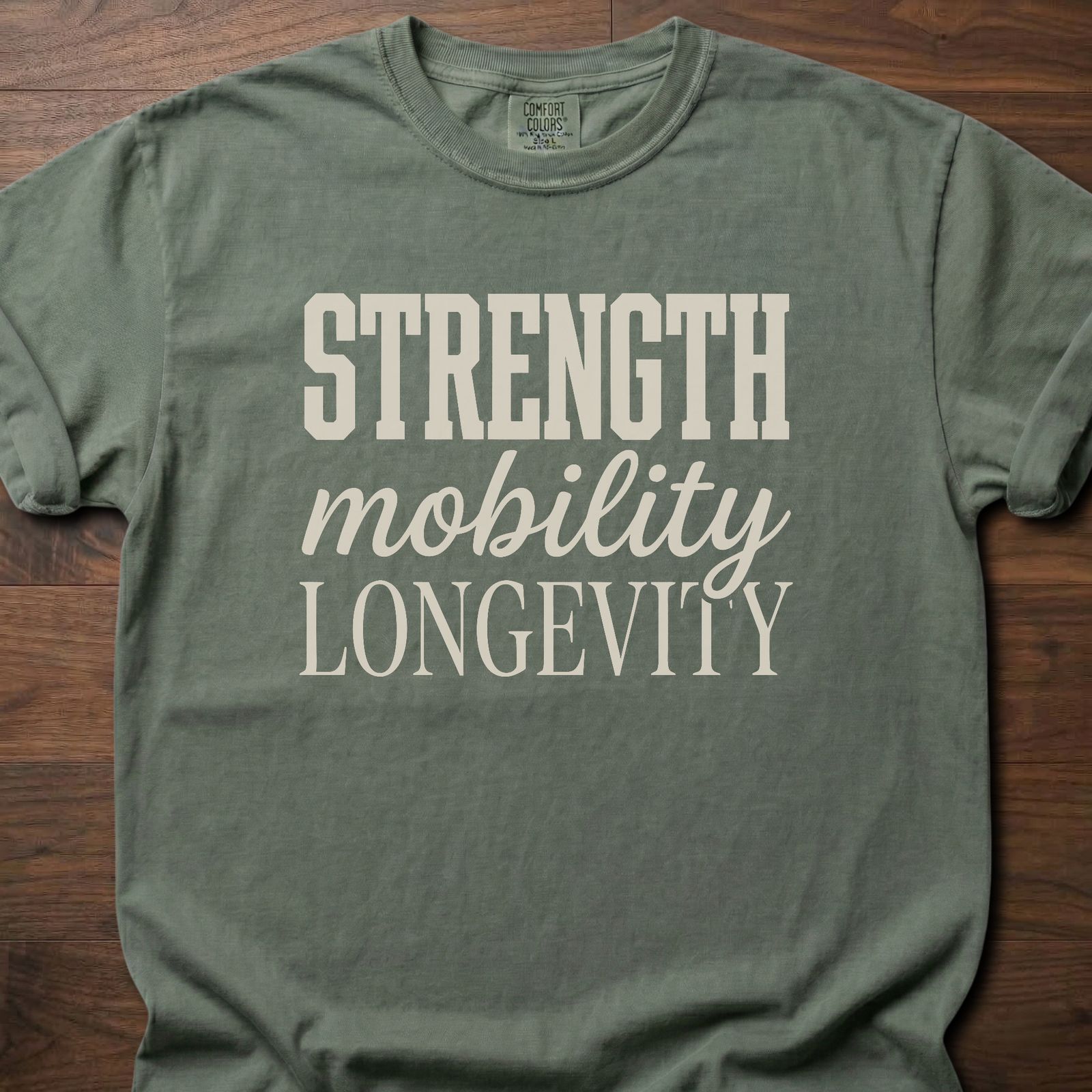 Strength Mobility Longevity strength training lifestyle clothing with bold typography design – Moss